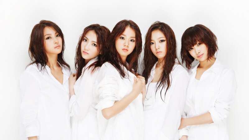 five women in white shirts