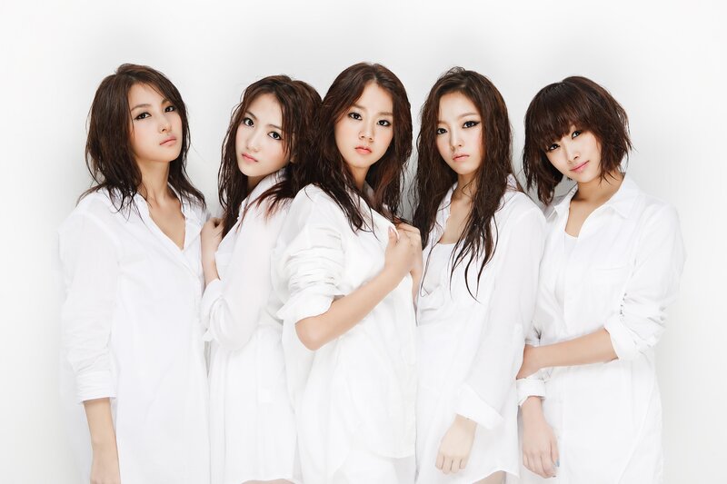 five women in white shirts