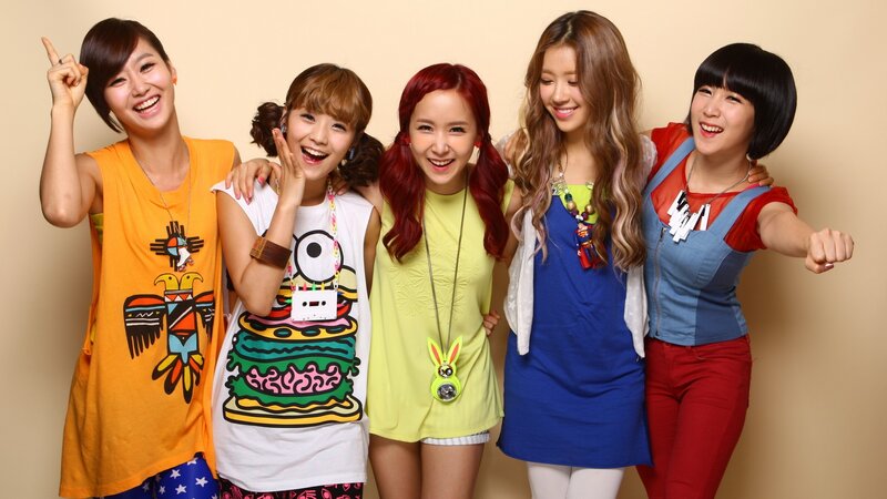 Five Women Posing Together — Yellow