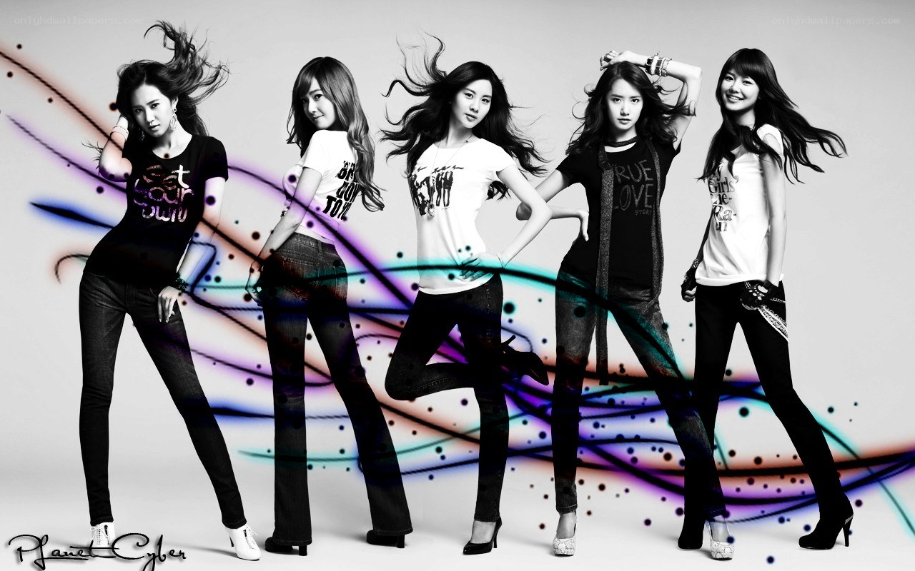 five women posing with colorful lines