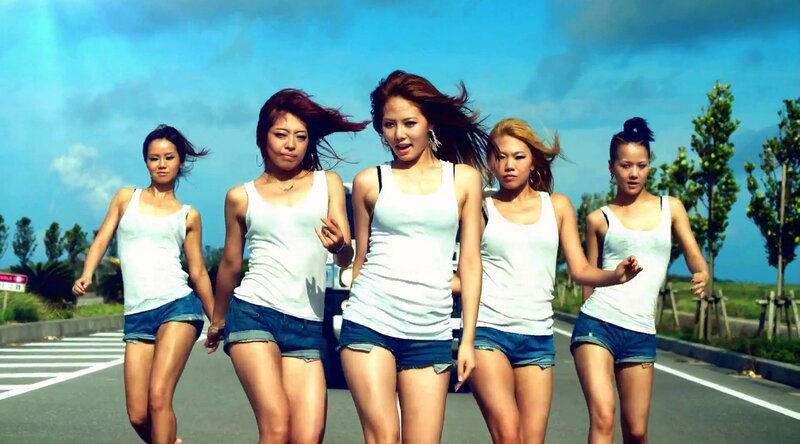 five women running on road