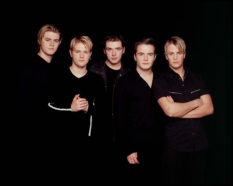 five young men in black