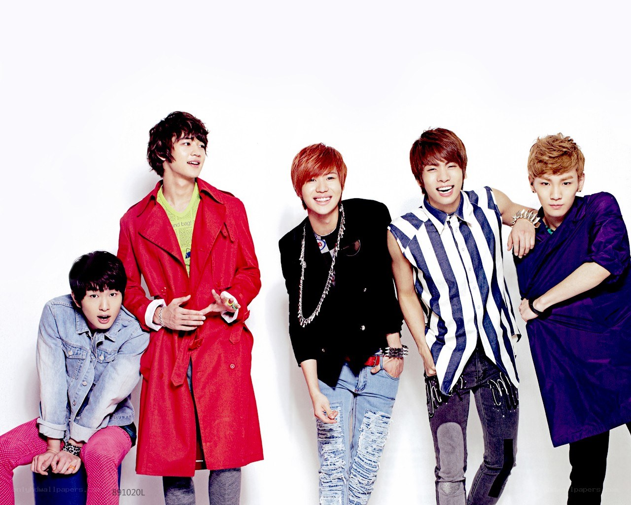 five young men in colorful clothes