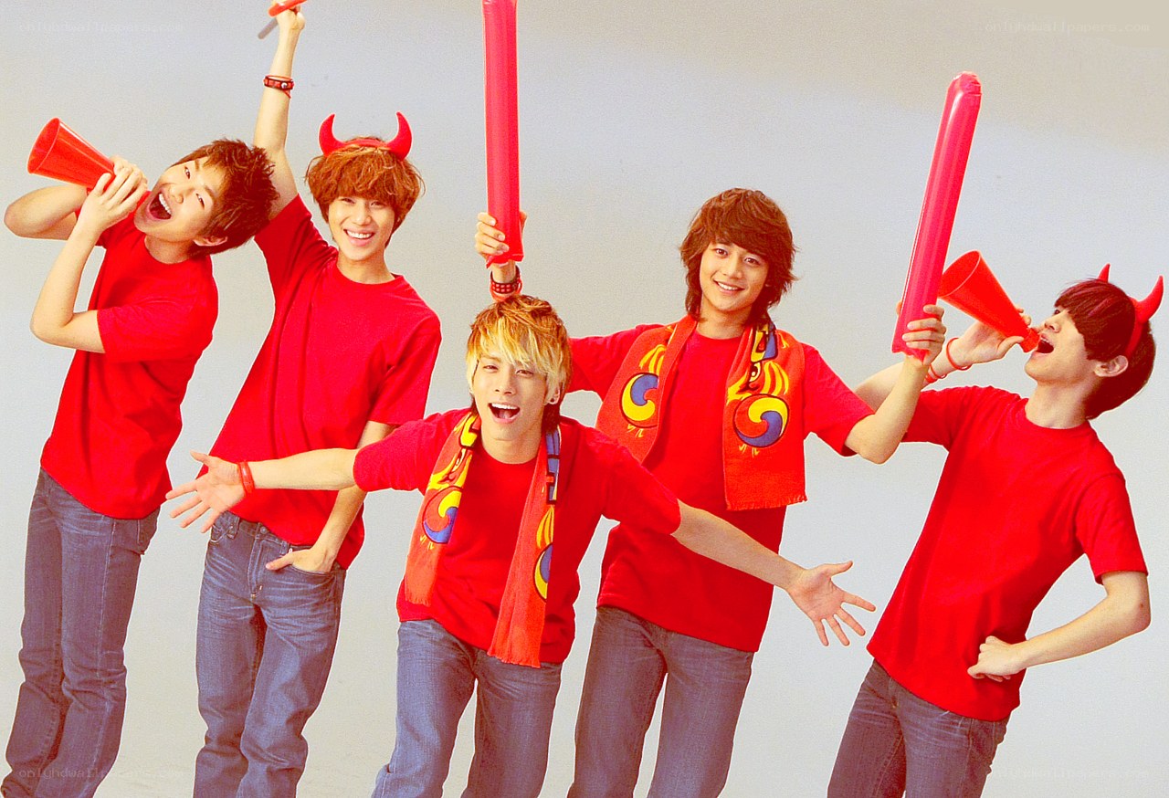 five young men in red shirts