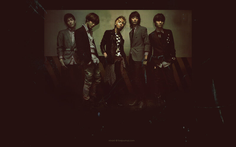 five young men in suits