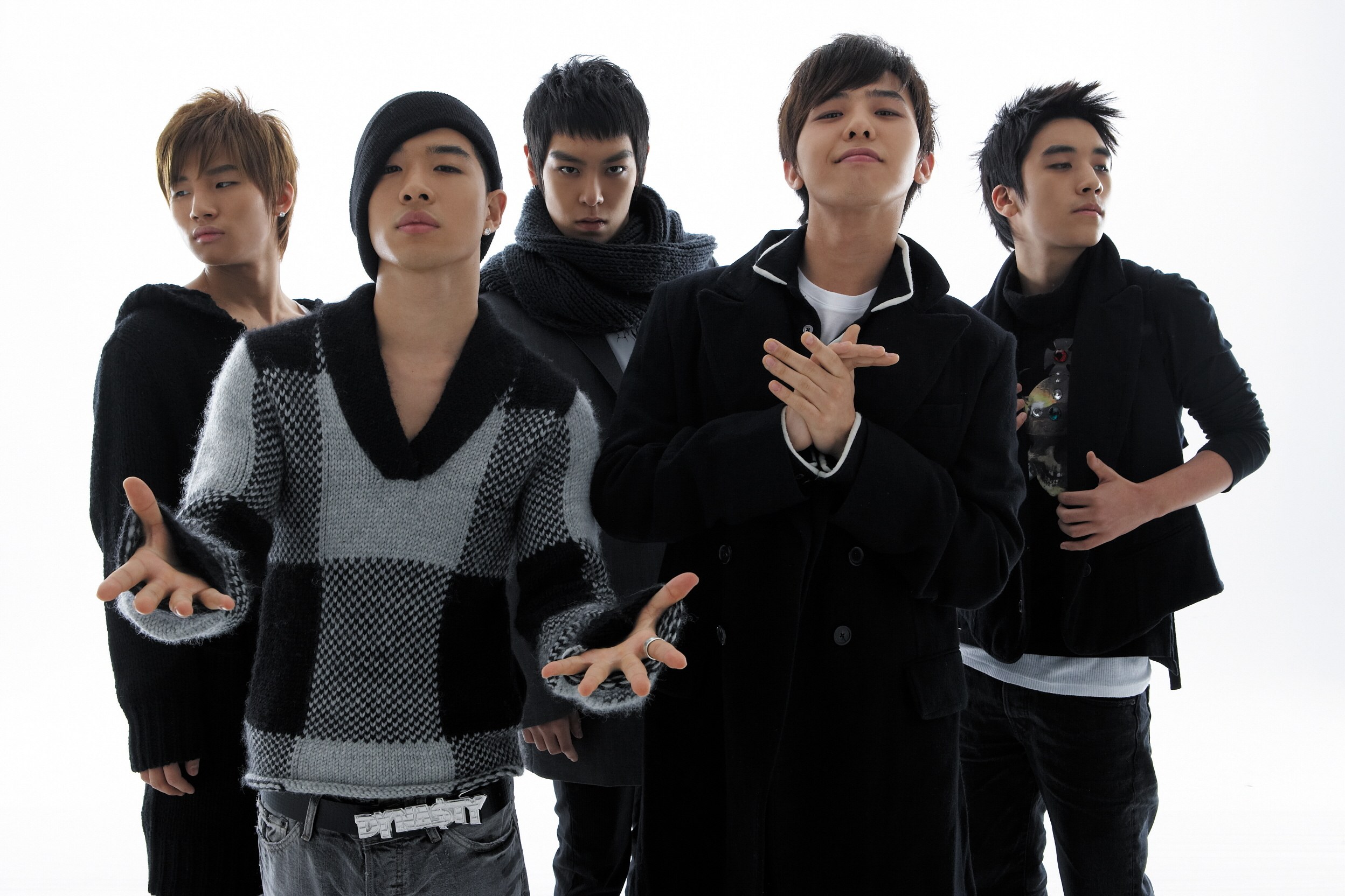 five young men in winter clothing