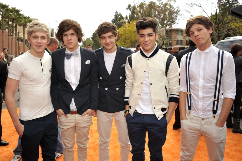 Five Young Men on Red Carpet — Orange