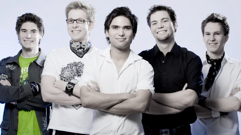 five young men posing together