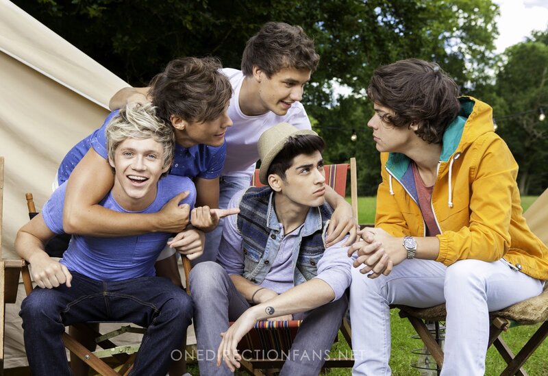 Five Young Men Sitting — Green, Relaxed