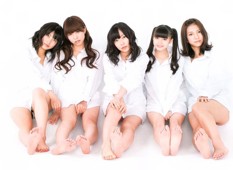 Five Young Women in White Shirts