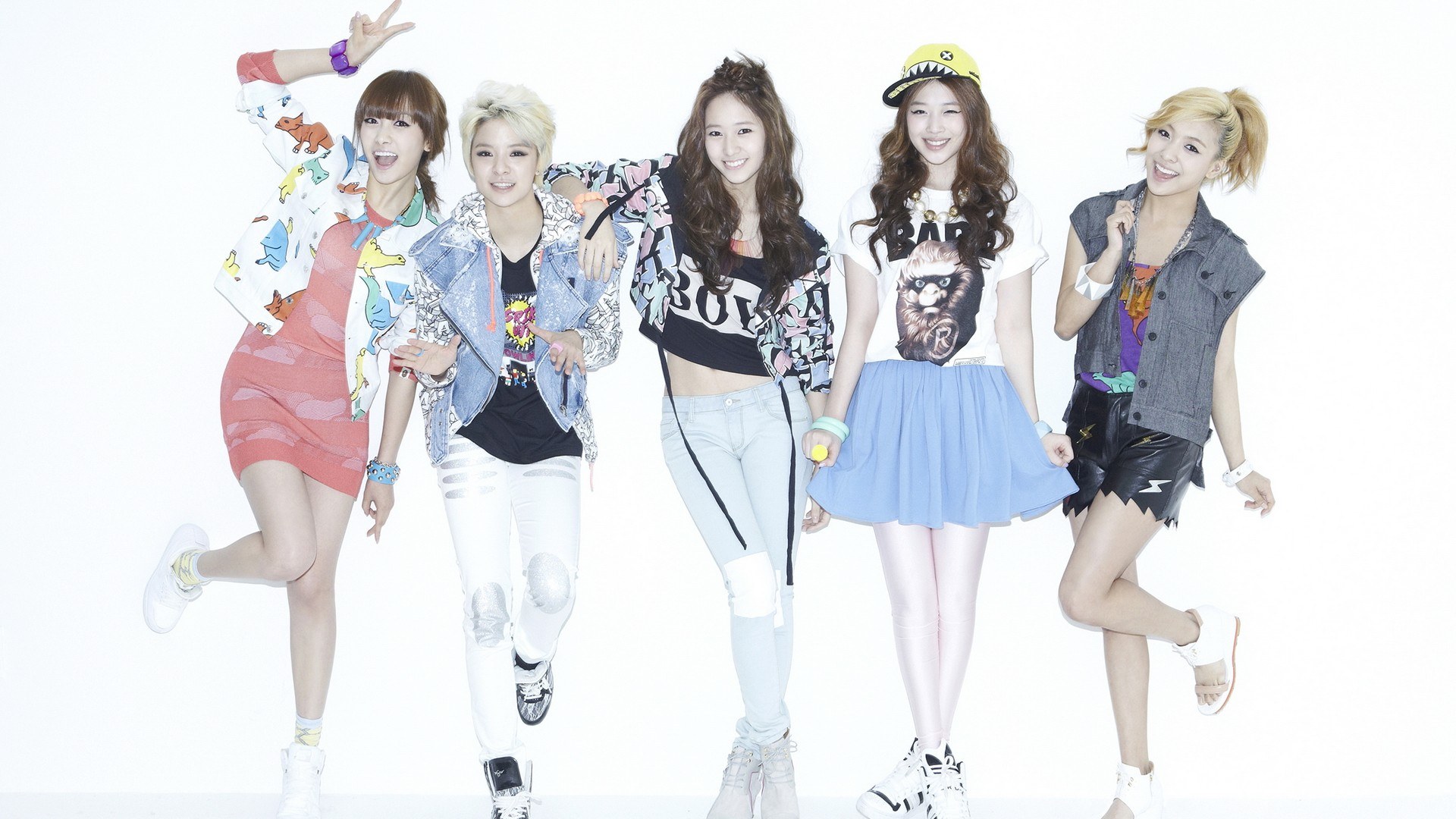 five young women posing together
