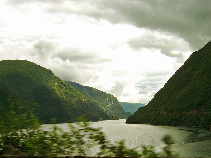 fjord between green hills