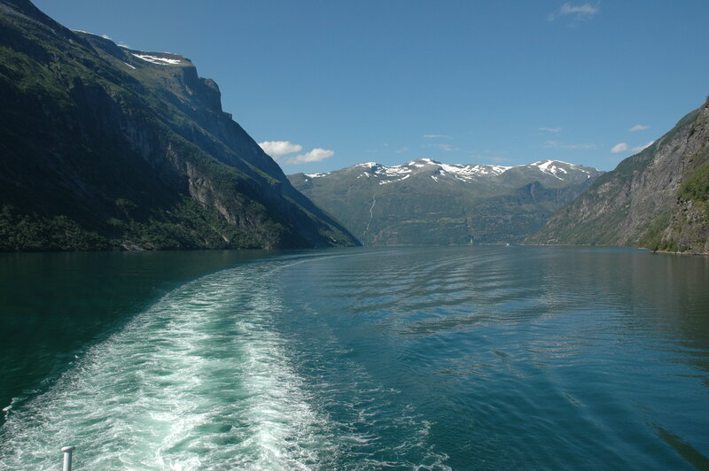 Fjord cruise with boat wake