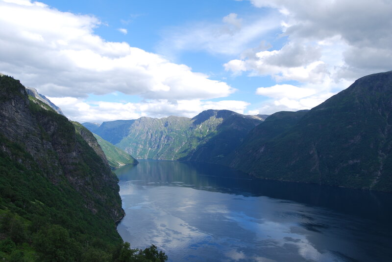 fjord surrounded by mountains
