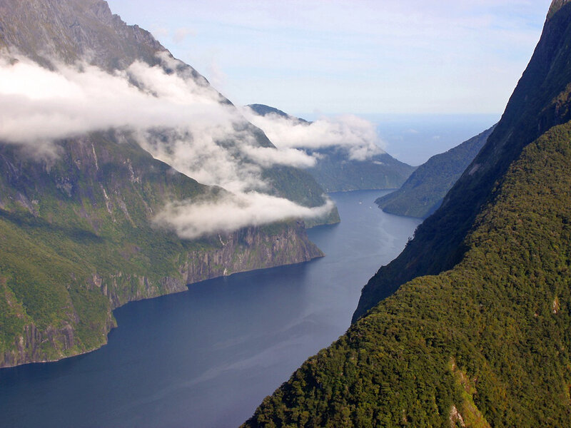 fjord with clouds and mountains
