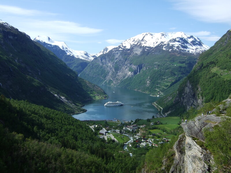 fjord with cruise ship and mountains