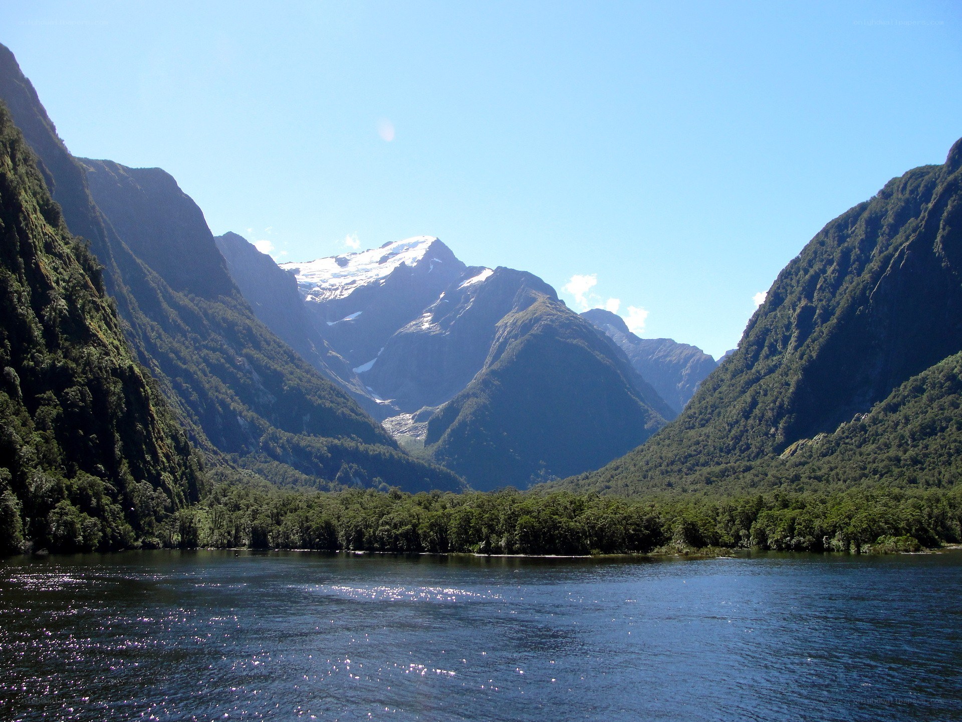 fjord with snow-capped mountains