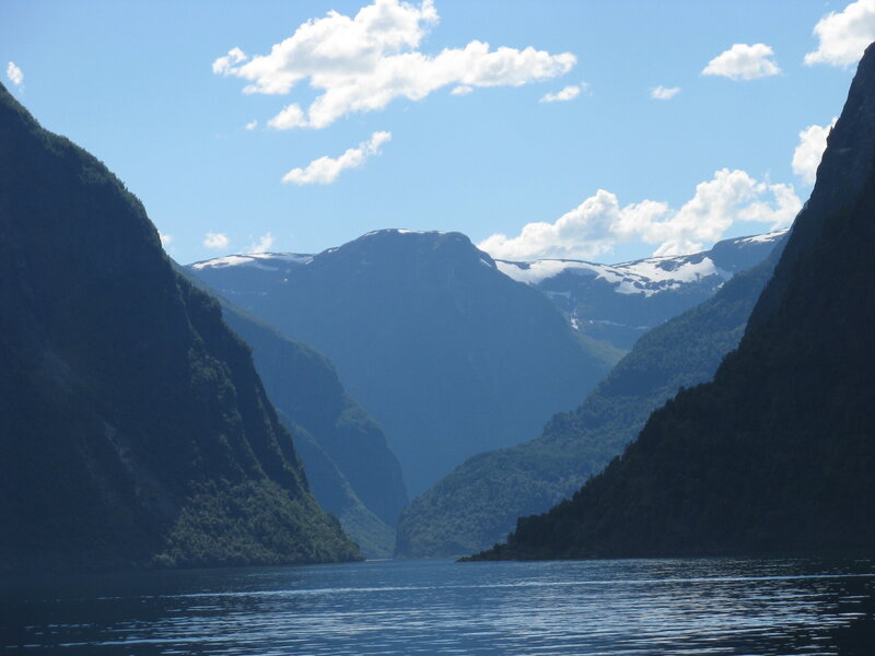 fjord with snow-capped mountains