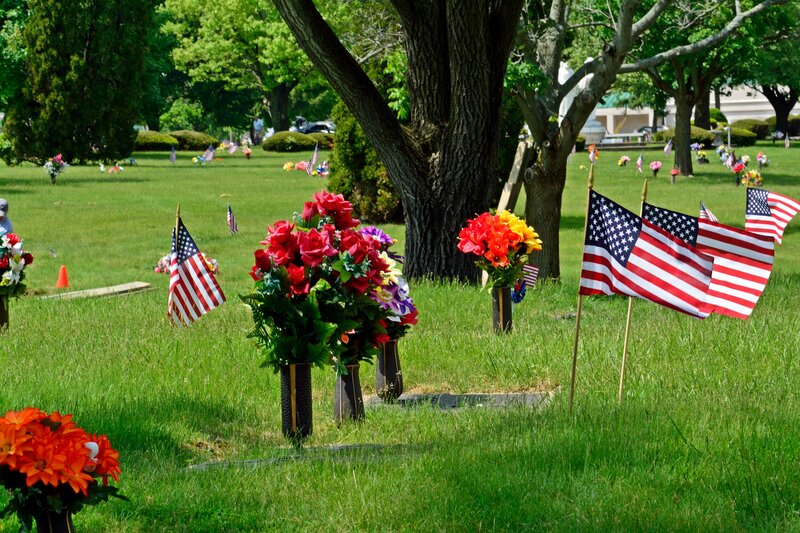 Flags and Flowers at Graves