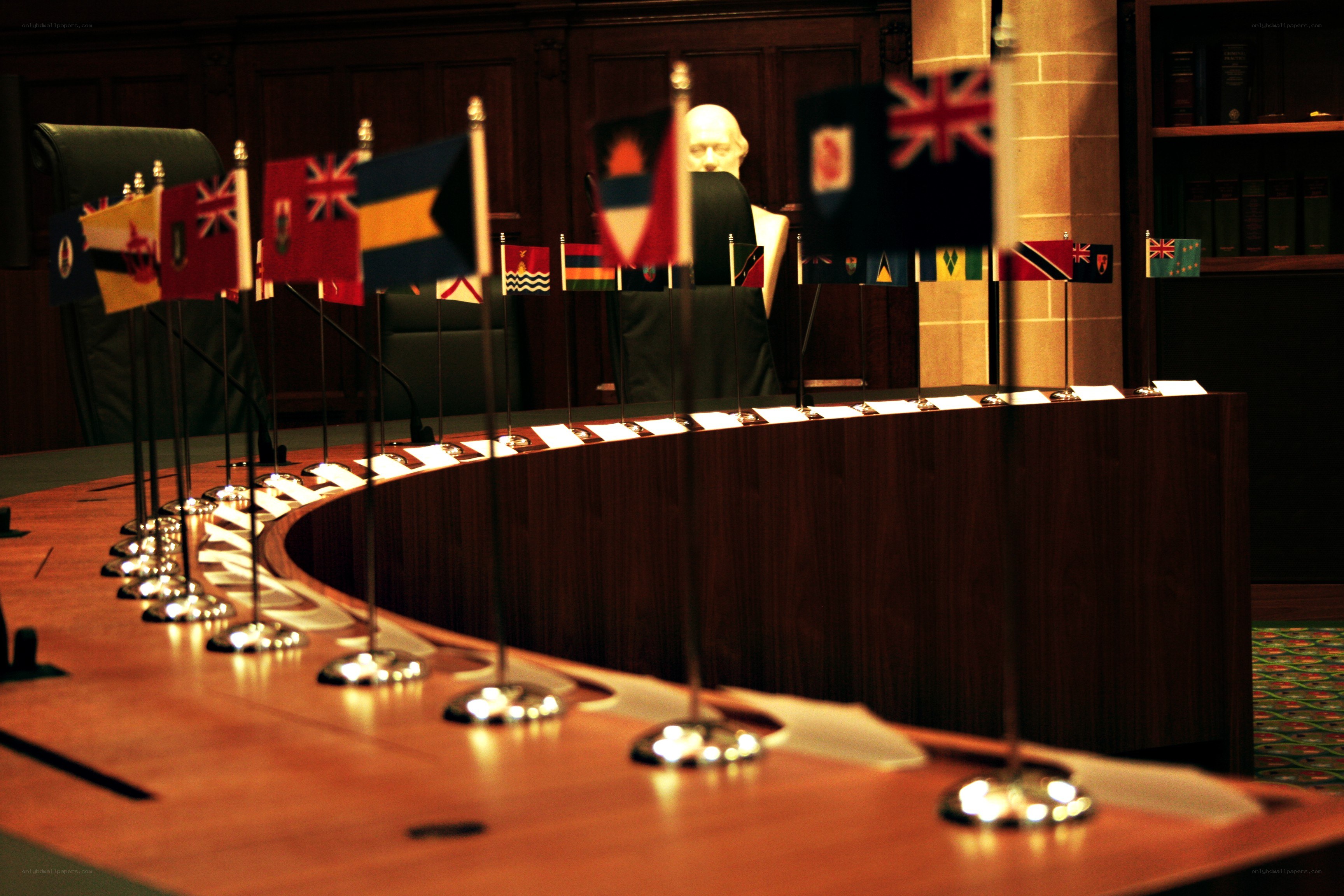 flags at a conference table
