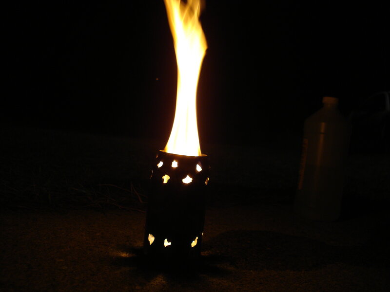 Flame from a perforated container