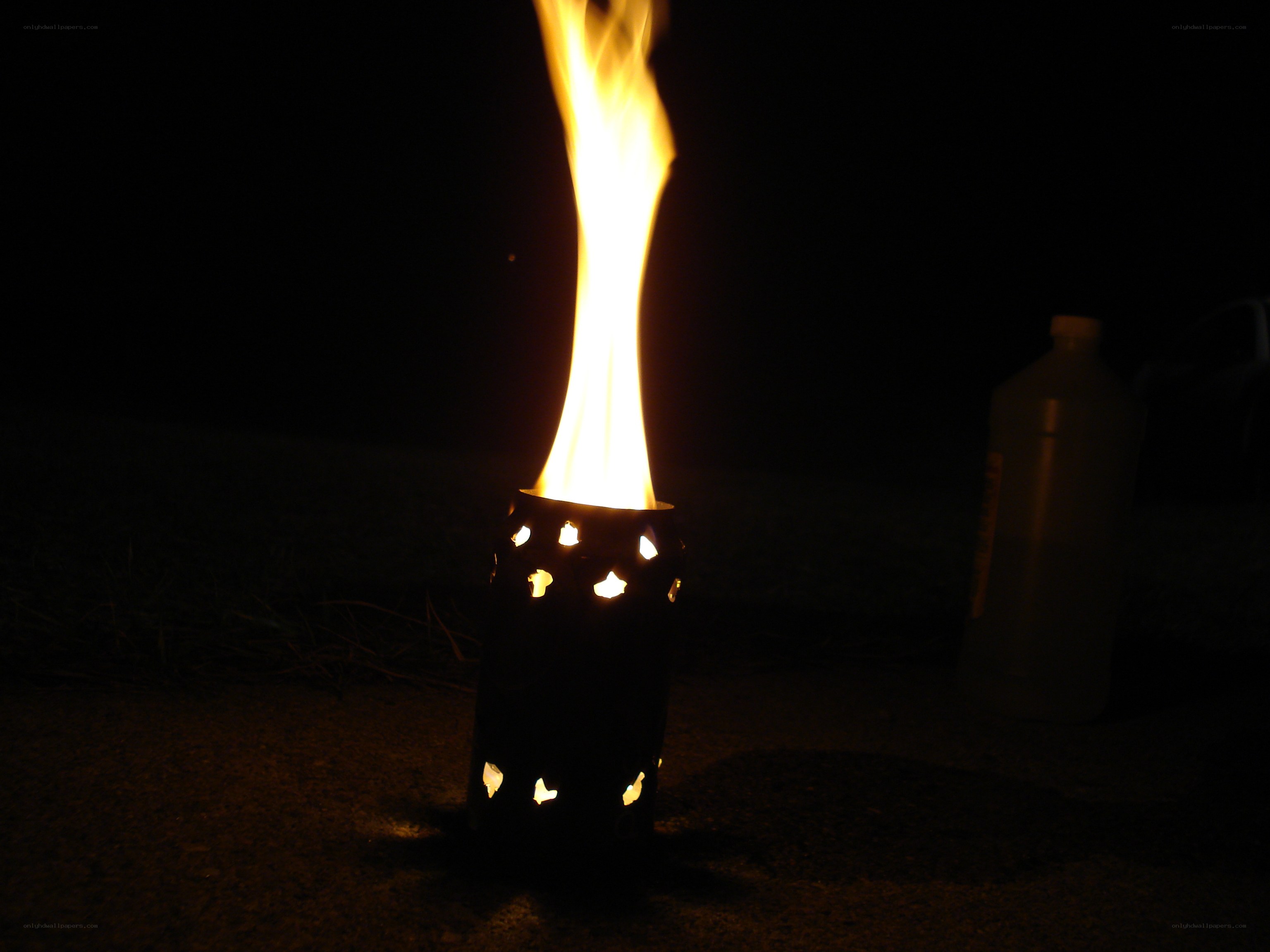 Flame from a perforated container