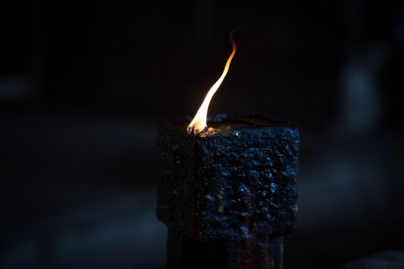 Flame on Dark Block