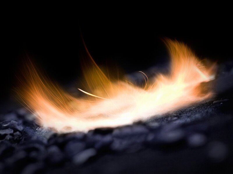 flame on dark surface
