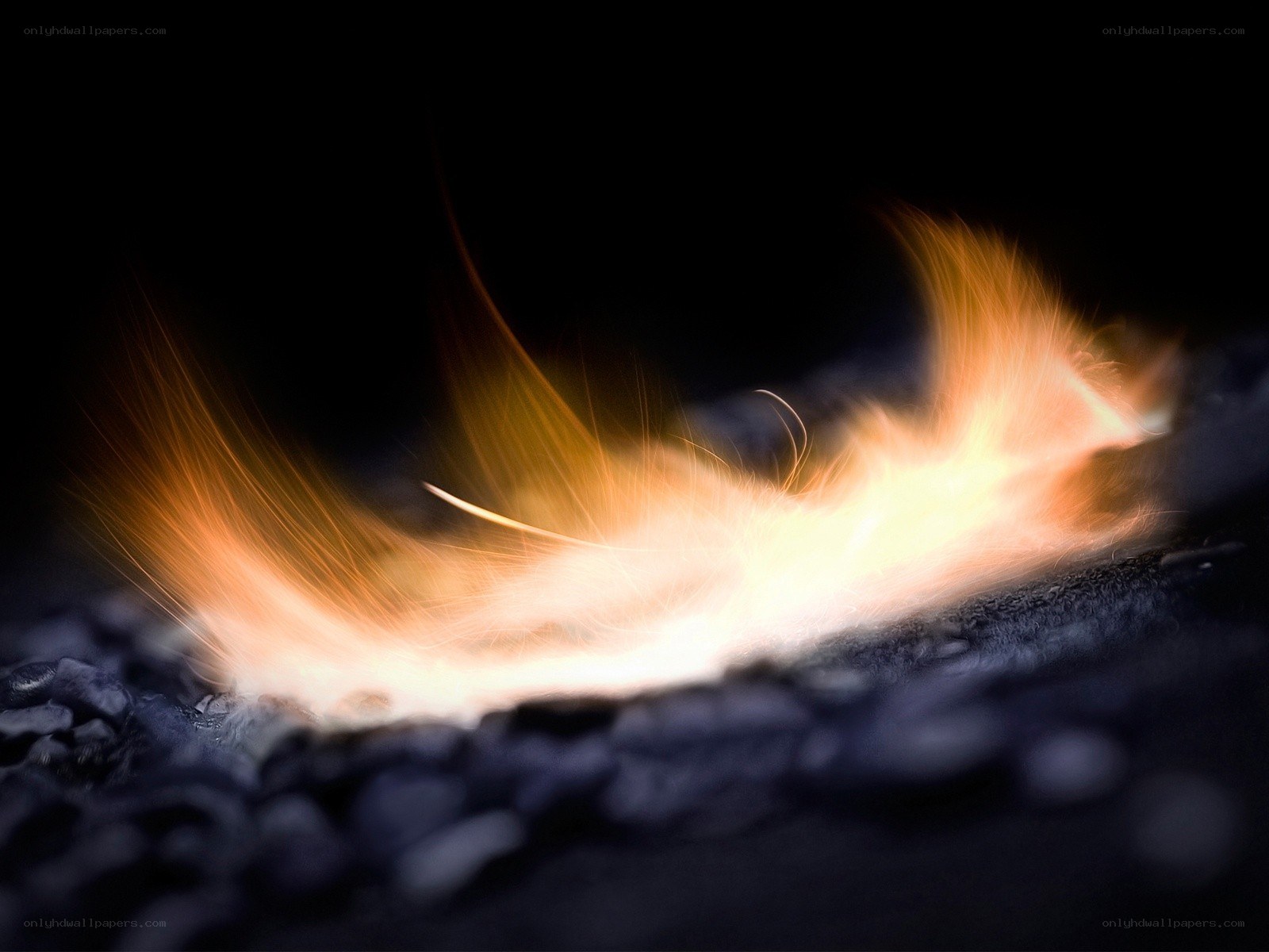 flame on dark surface