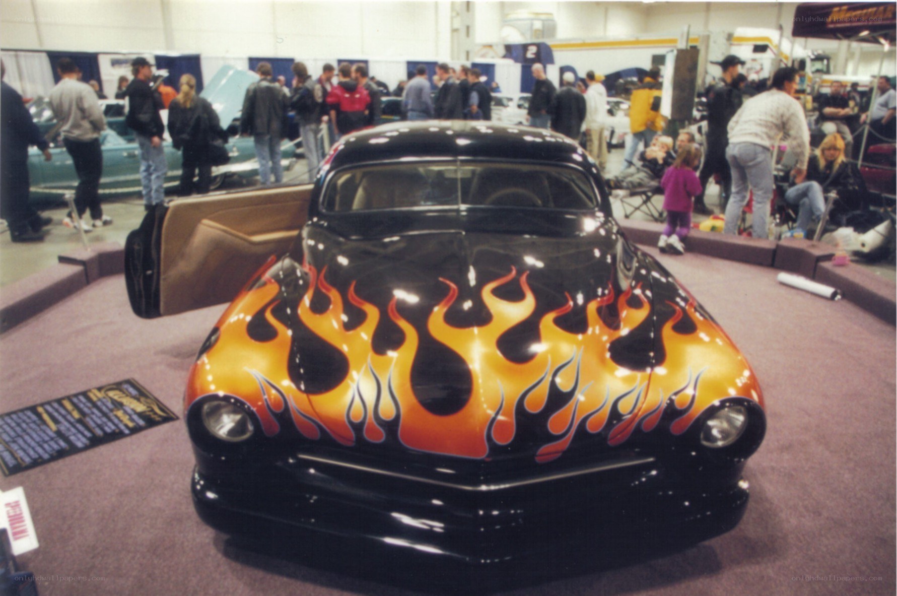 Flame-painted car at a show
