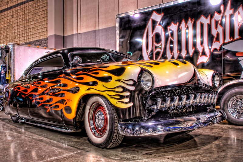Flame-painted classic car on display