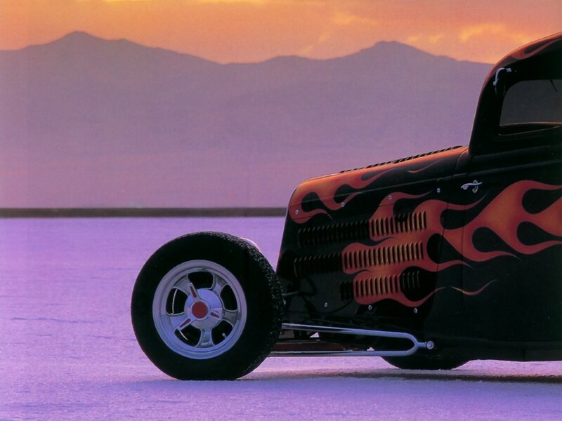 Flame-painted hot rod on salt flat