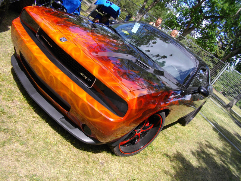 Flame-painted muscle car at show