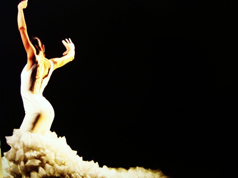 Flamenco dancer in white dress