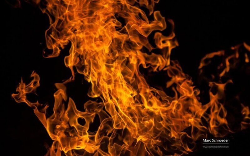 Flames Against Black Background — Orange, Dramatic