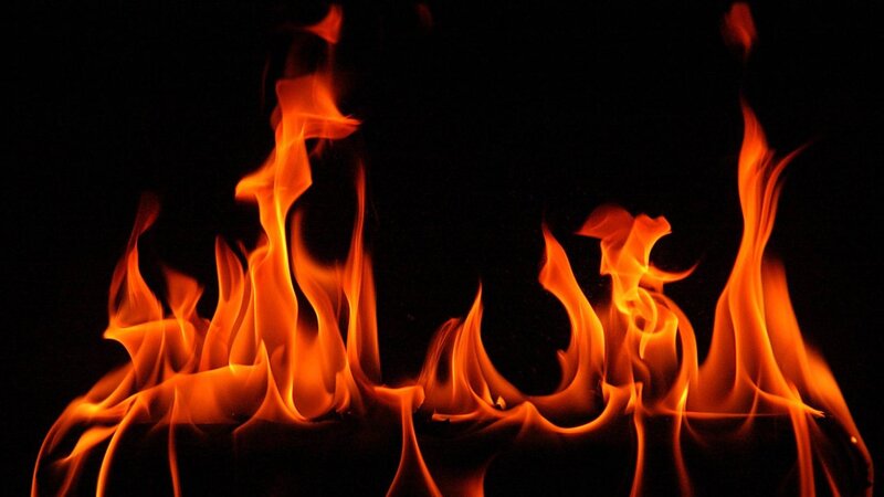 Flames Against Black Background — Orange