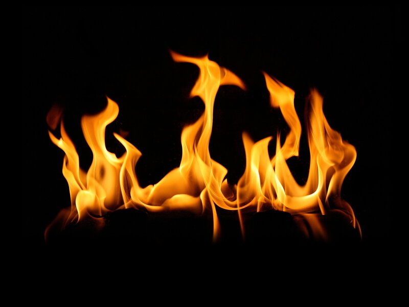 Flames Against Black — Orange