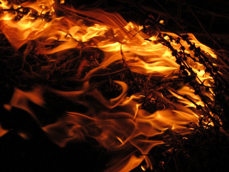 Flames burning at night