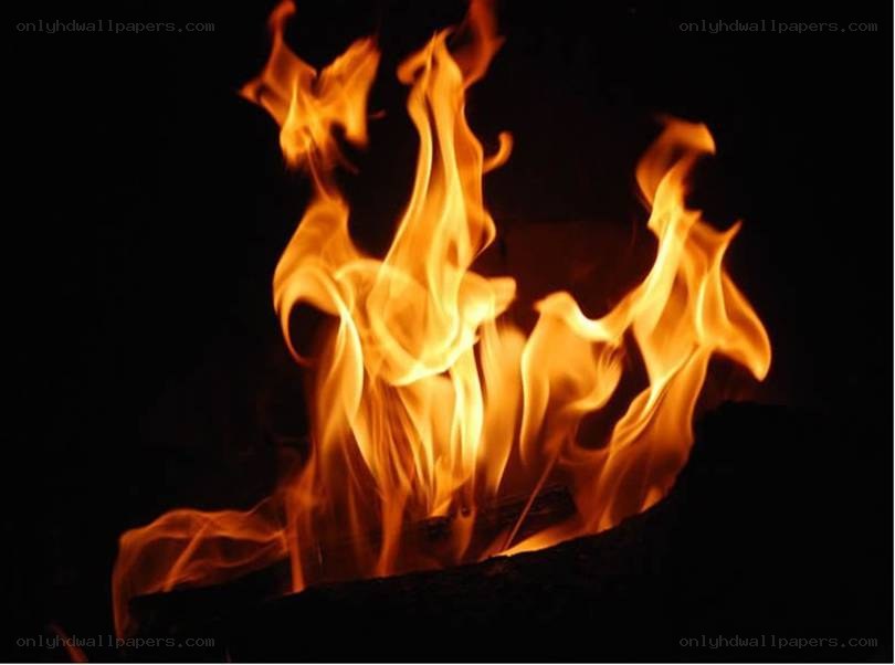 flames burning in the dark