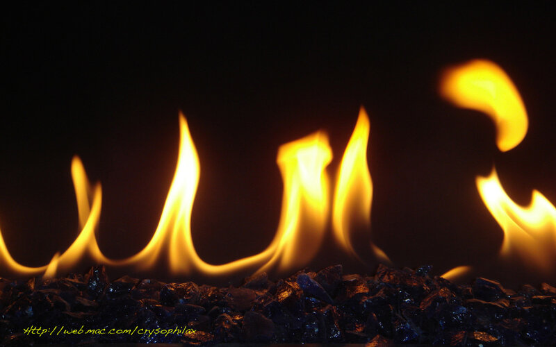 Flames on glass pebbles