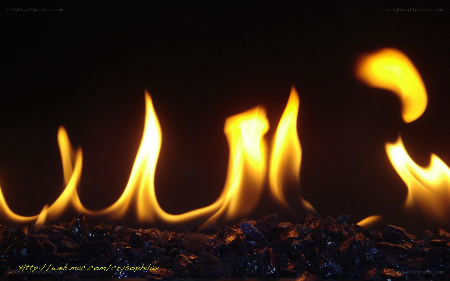 Flames on glass pebbles