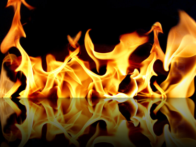 Flames on Reflective Surface — Yellow, Dramatic
