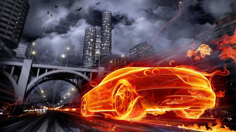 Flaming car in city at night