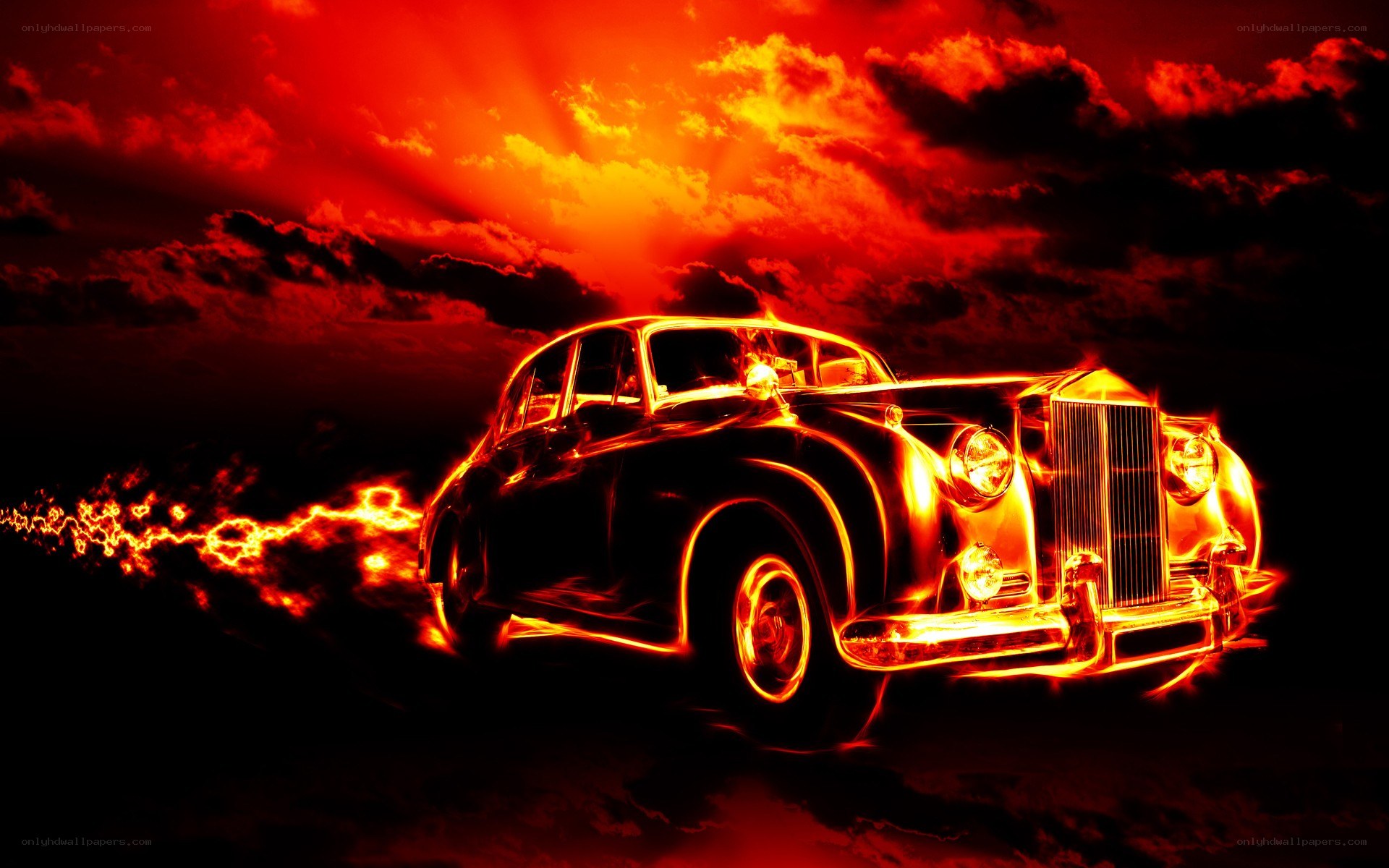 Flaming classic car at sunset