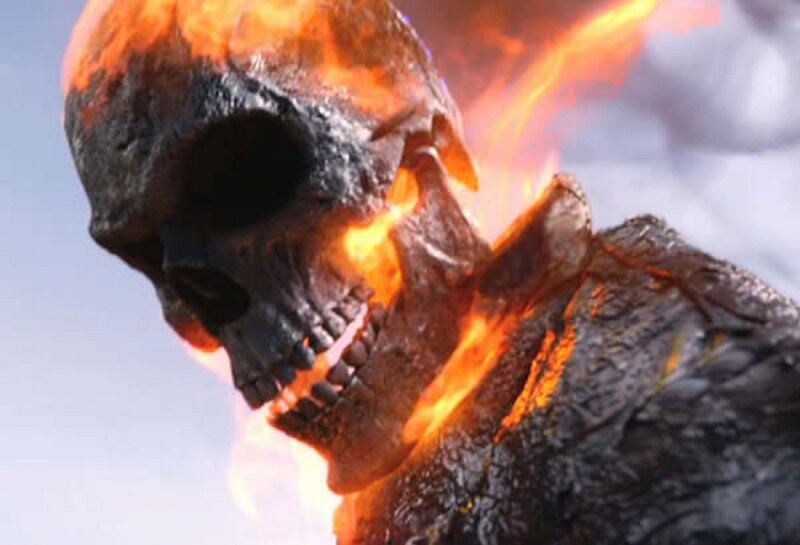 Flaming Skull Figure — Orange