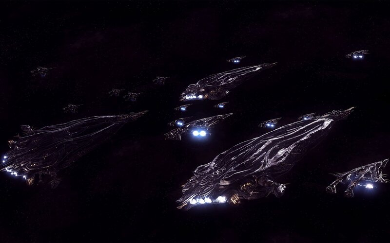 Fleet of alien ships in space