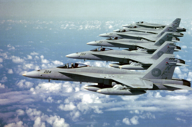 Fleet of fighter jets in formation