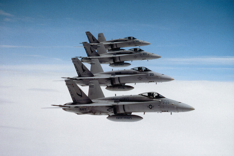 Fleet of fighter jets in formation