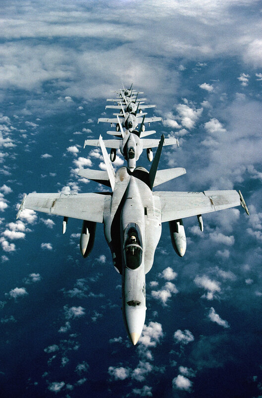 Fleet of fighter jets in formation