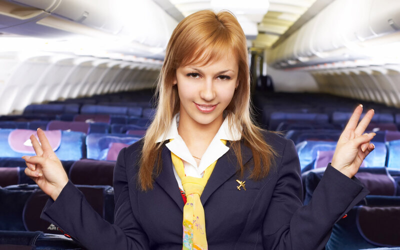 Flight Attendant in Airplane